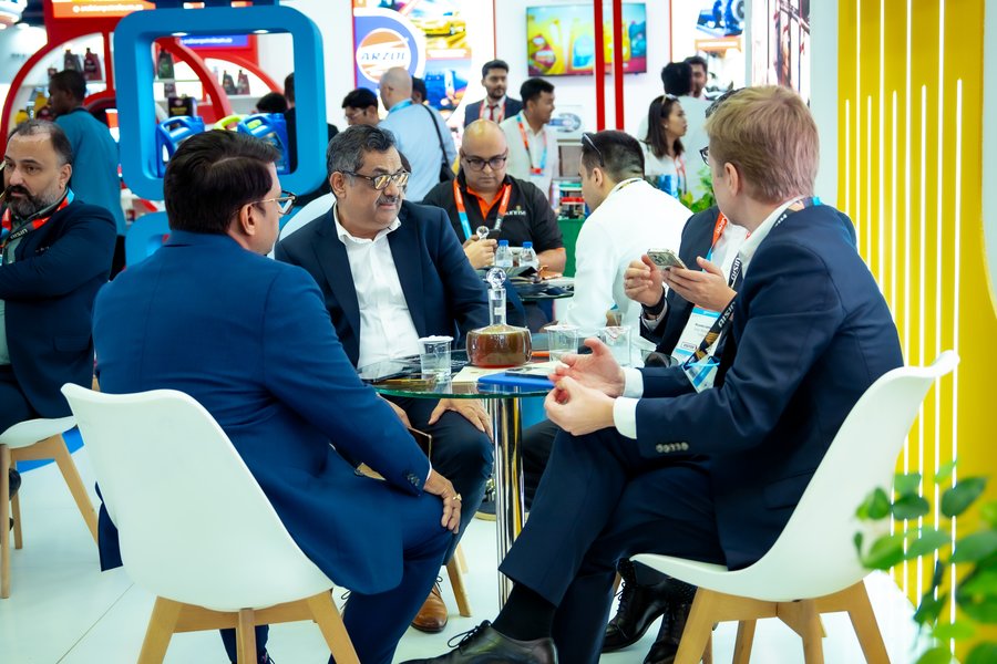 Trade Visitors Exploring DRIVURA Lubricants Lineup